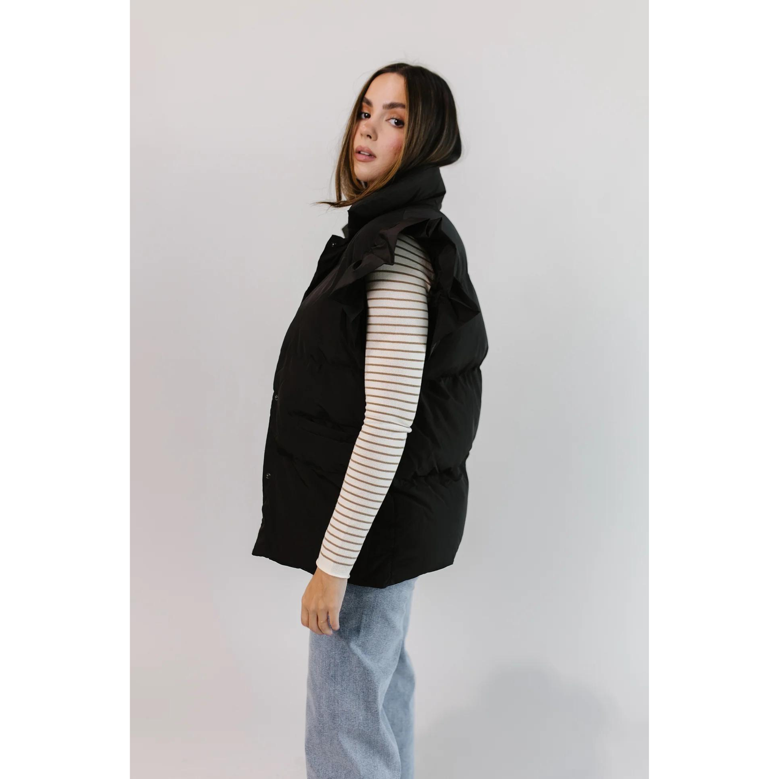 https://curiocollective.com/cdn/shop/products/Curio-collective-stockplace-puff-vest_1600x.png?v=1701977700